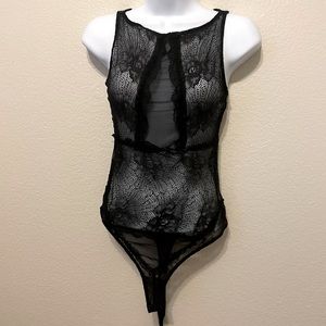 GUESS sheer sleeveless body suit, size small. Never worn.